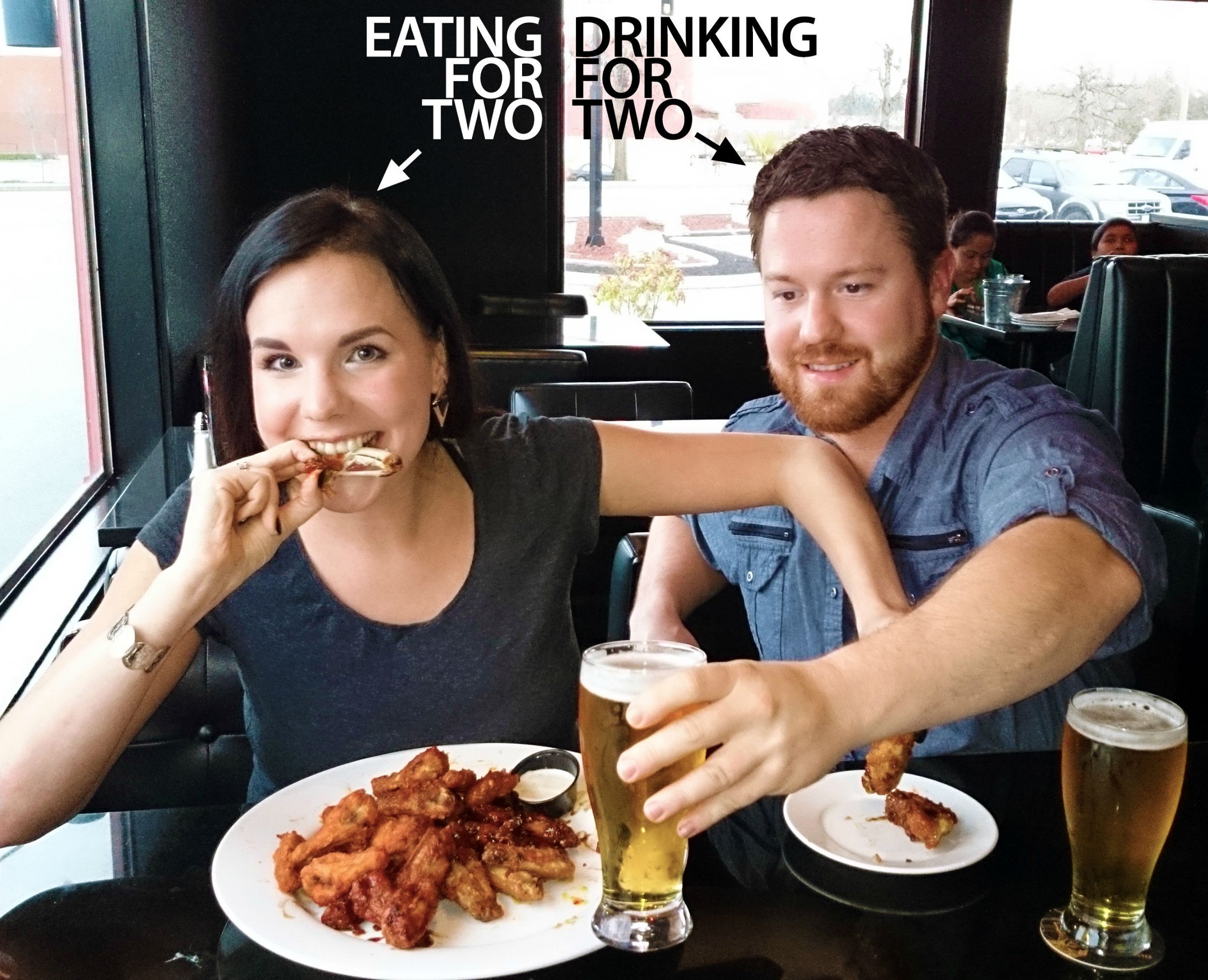 Couple with food and beer announcing a pregnancy