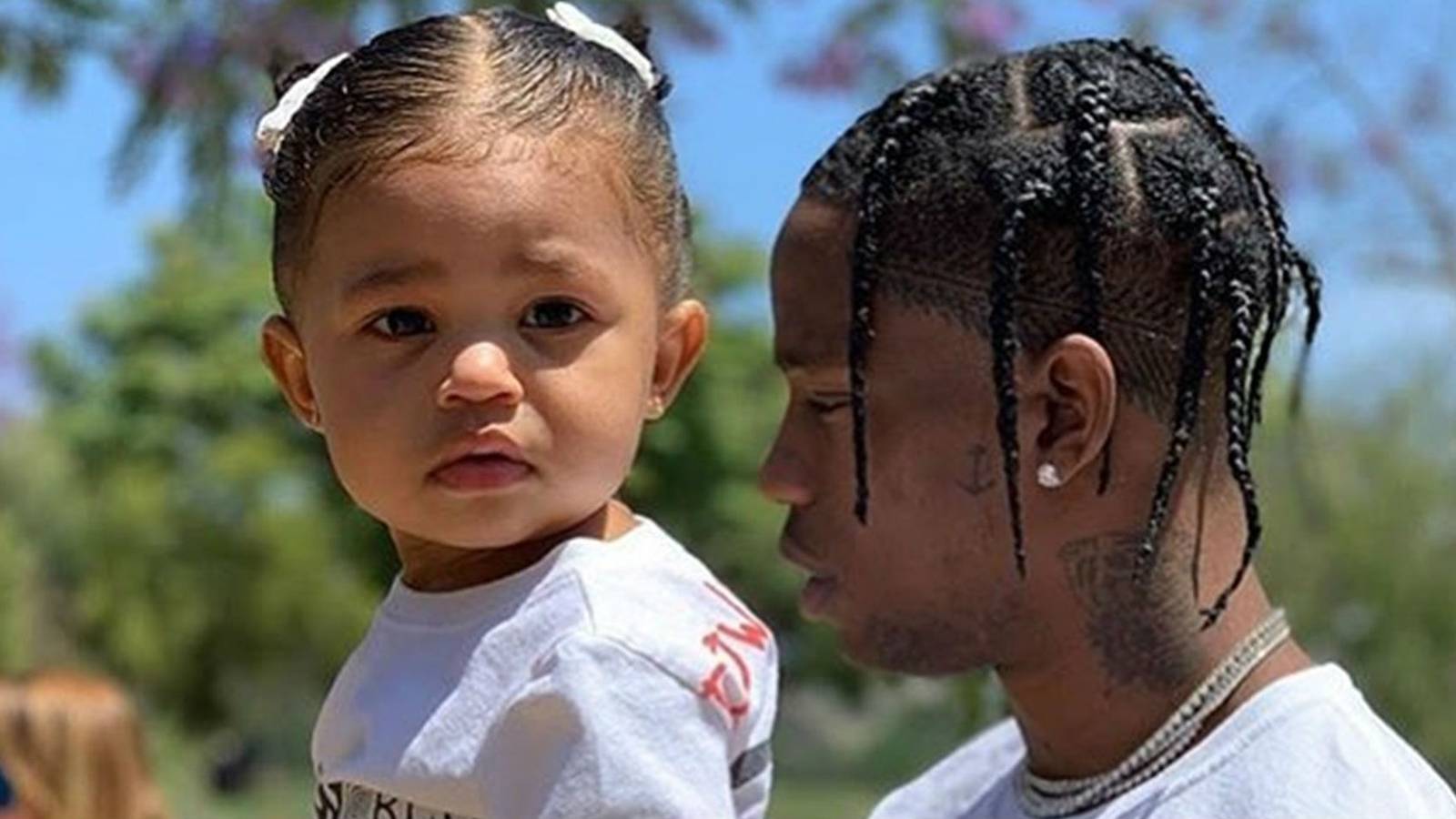 Travis Scott & 2-Year-Old Daughter Stormi Had A Cute Poolside Daddy