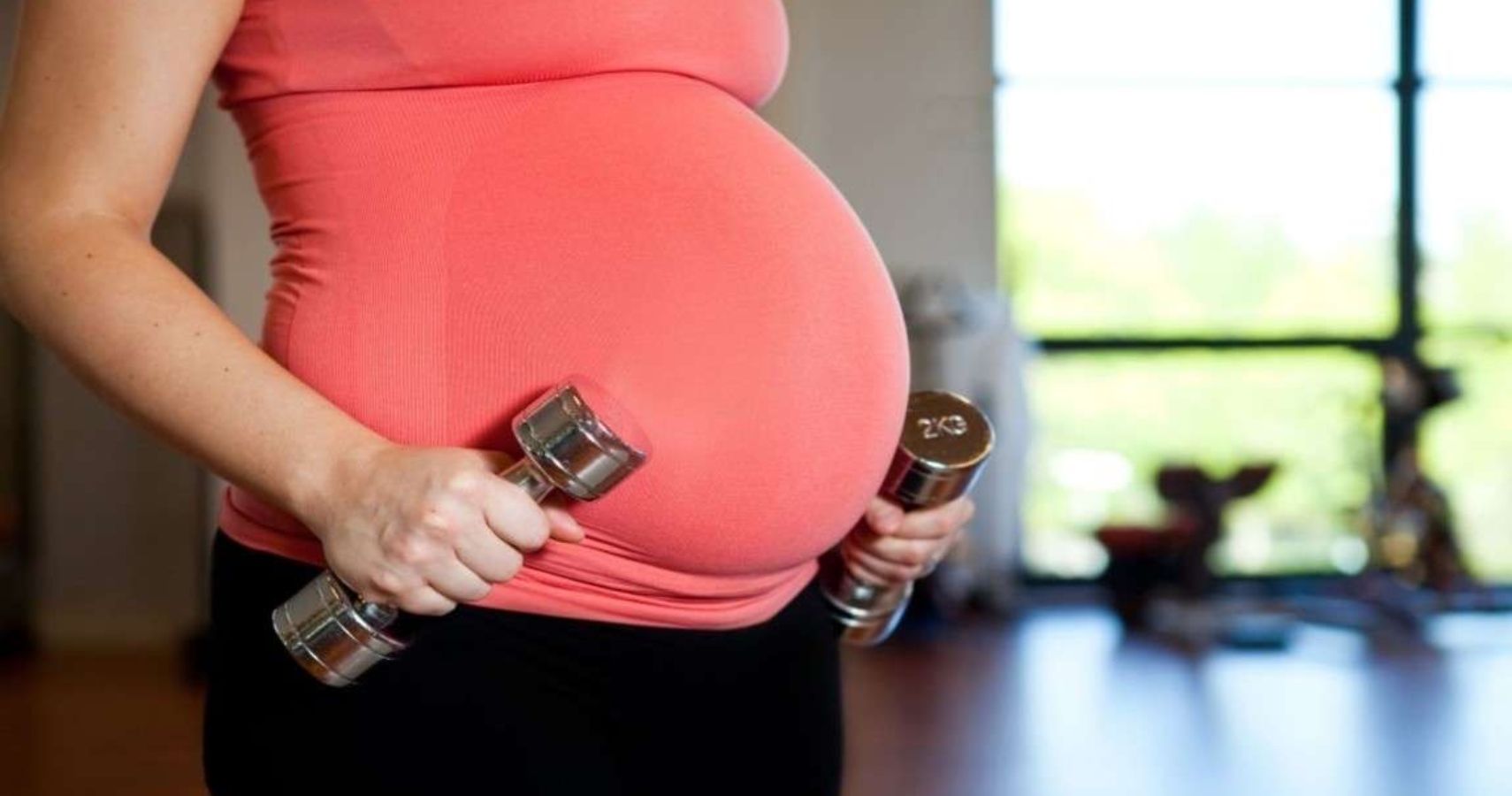 Pregnant Woman Weight Lifting