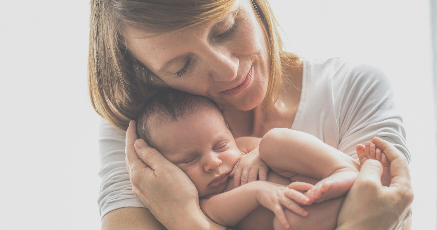 Newborn Screening Awareness mom holding their baby