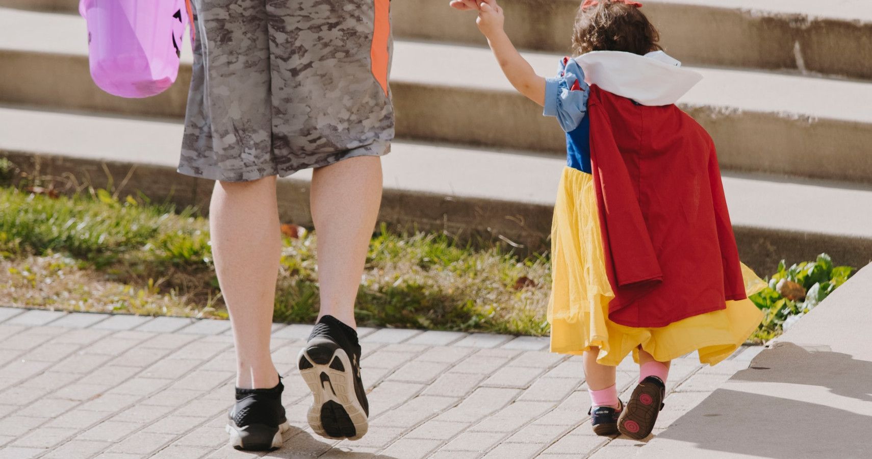 A young girl dressed as Snow White