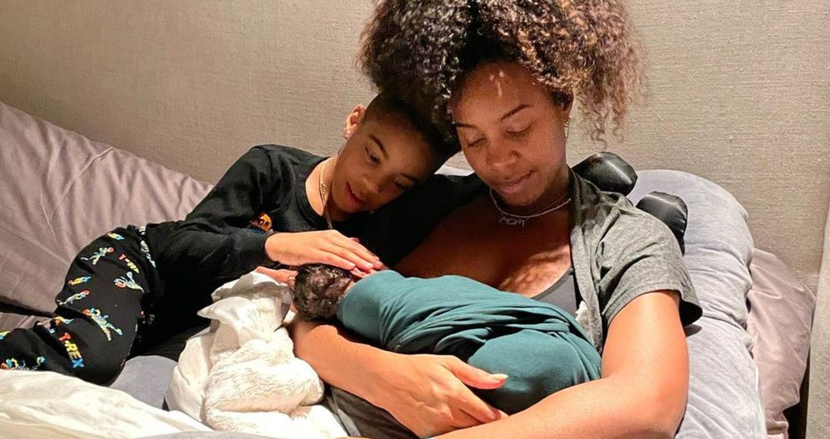 Kelly Rowland with her eldest son and her new baby
