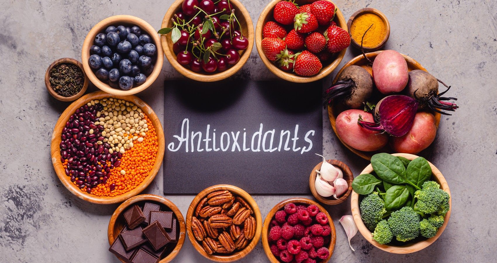 Photo of antioxidant-rich foods around a sign that says 