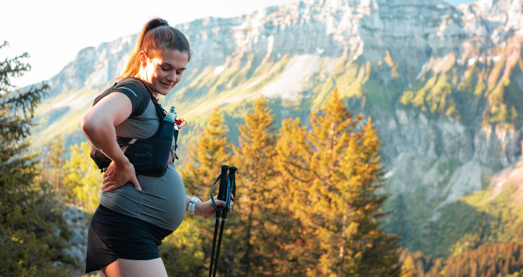A Woman On A Hike While Pregnant