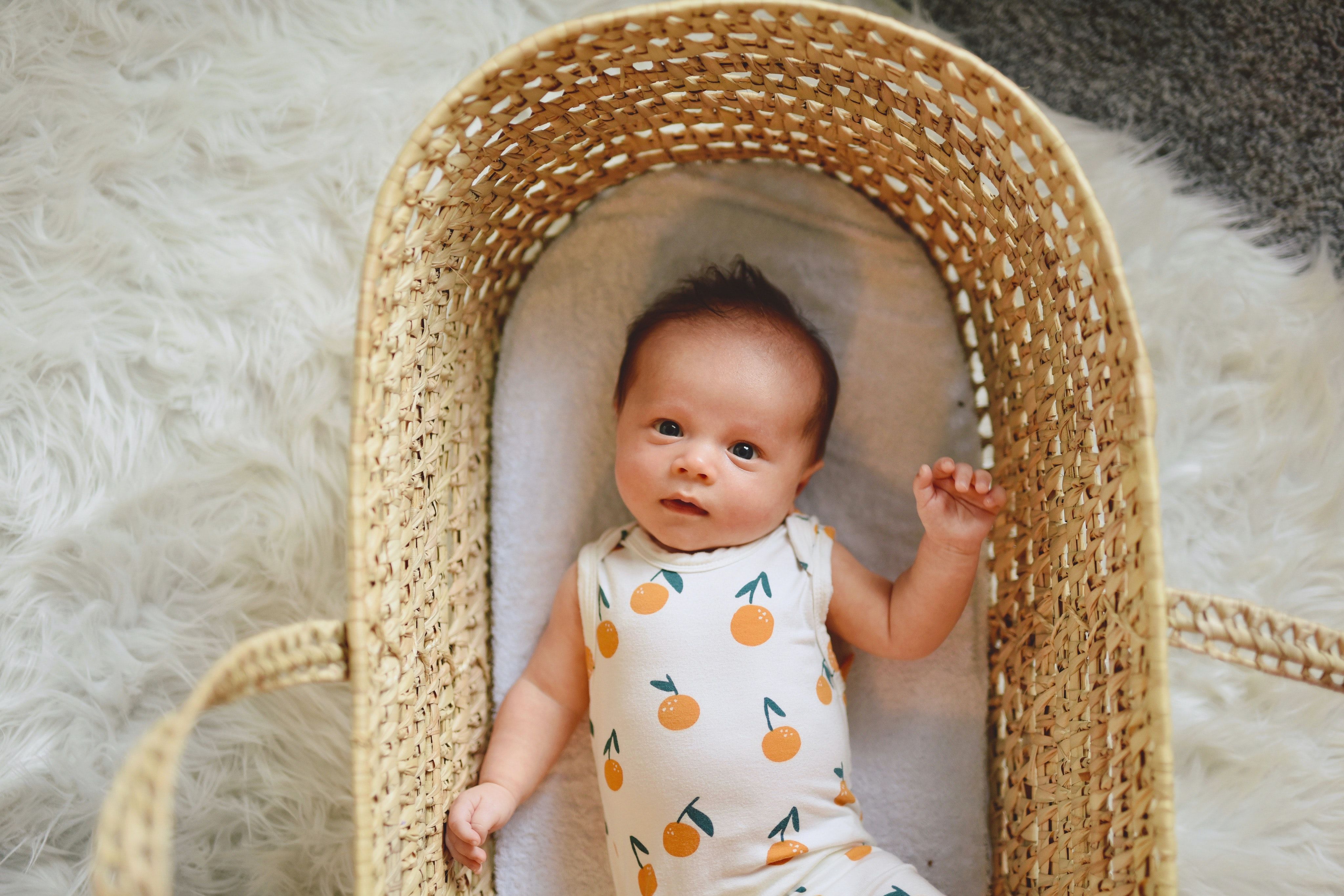 Baby in wicker basket 