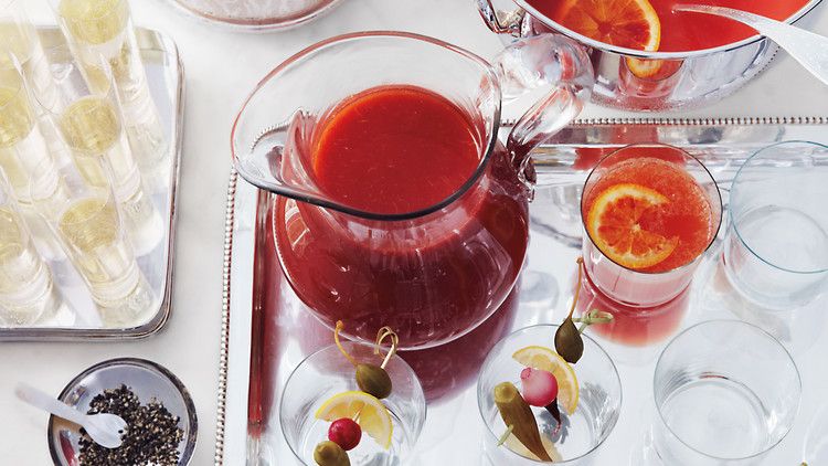 Photo of blood orange punch and drinking glasses
