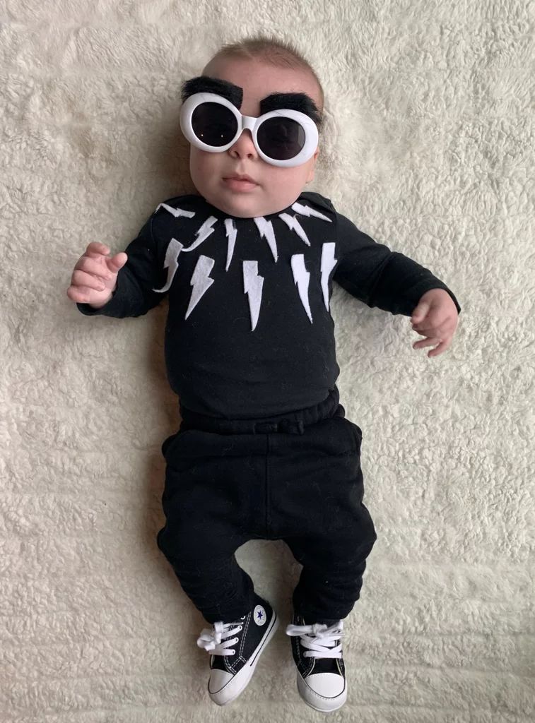 Baby In Onesie With Sunglasses Dressed Up As David Rose