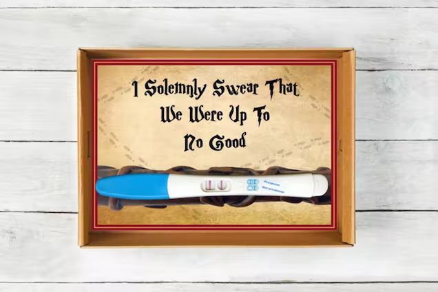 Photo of pregnancy test inside of frame used as announcement