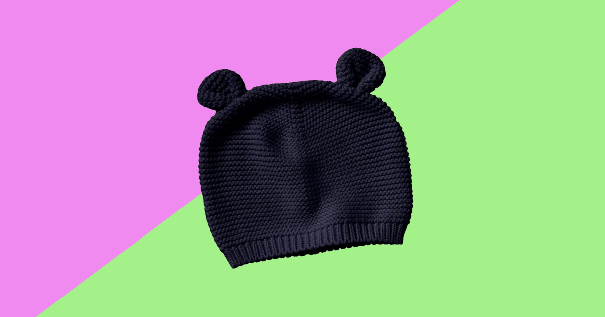 purple and green background with a blue baby hat