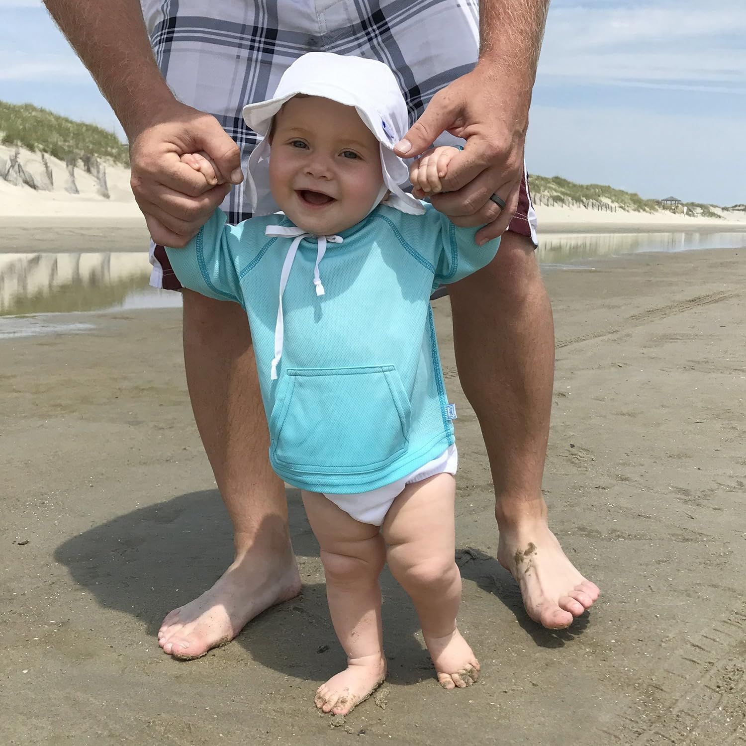 I play. Baby Flap Sun Protection Swim Hat