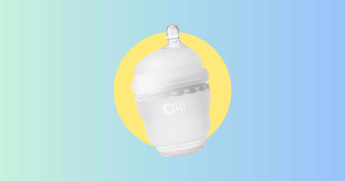 white silicone baby bottle on blue and yellow background