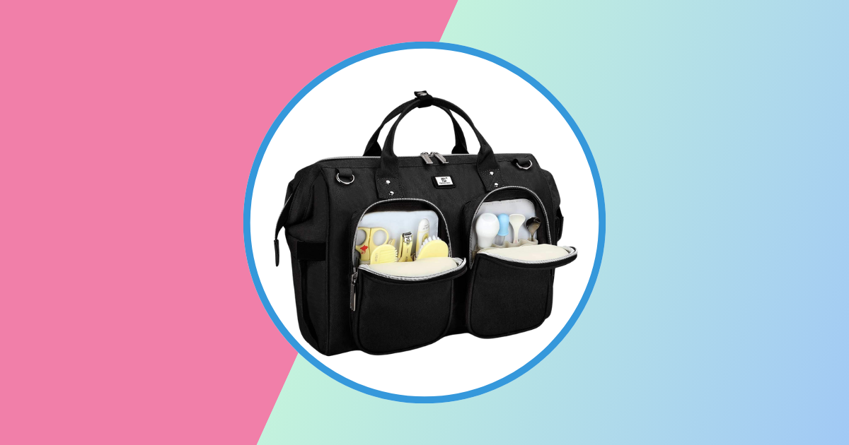 Black diaper bag on pink and blue background