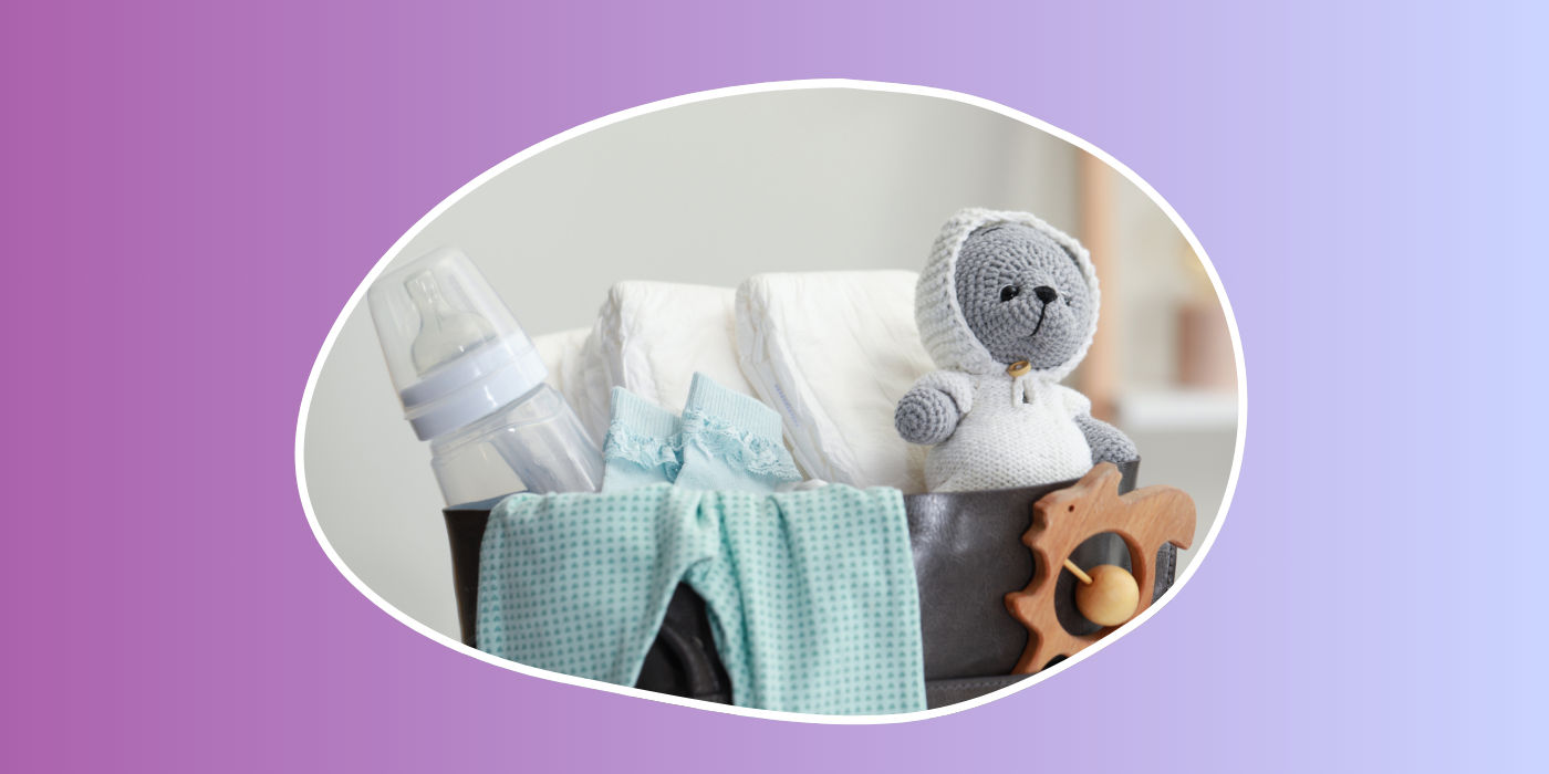 purple background with a diaper bag that has diapers, toys, and a bottle