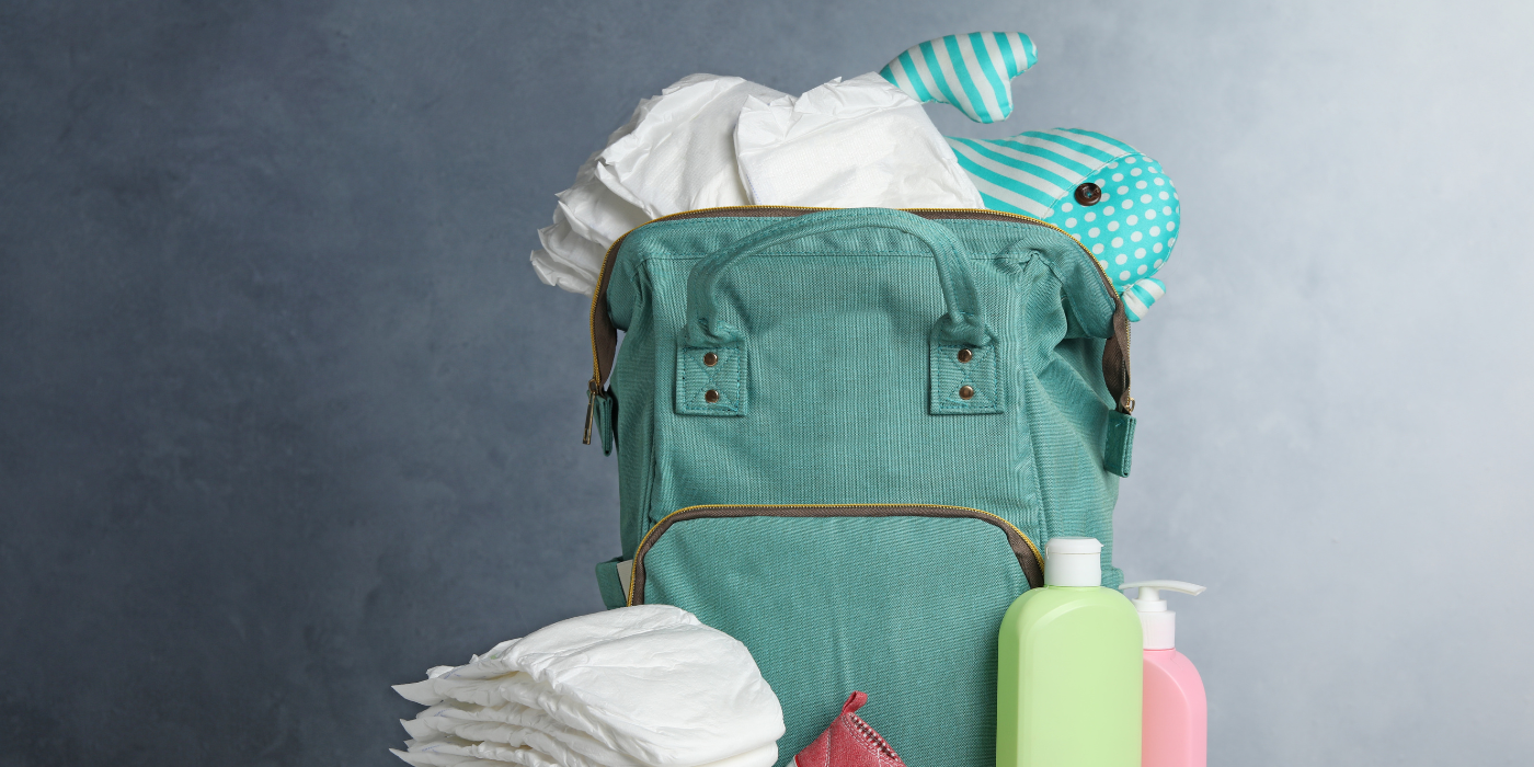 Diaper bag full of baby items 