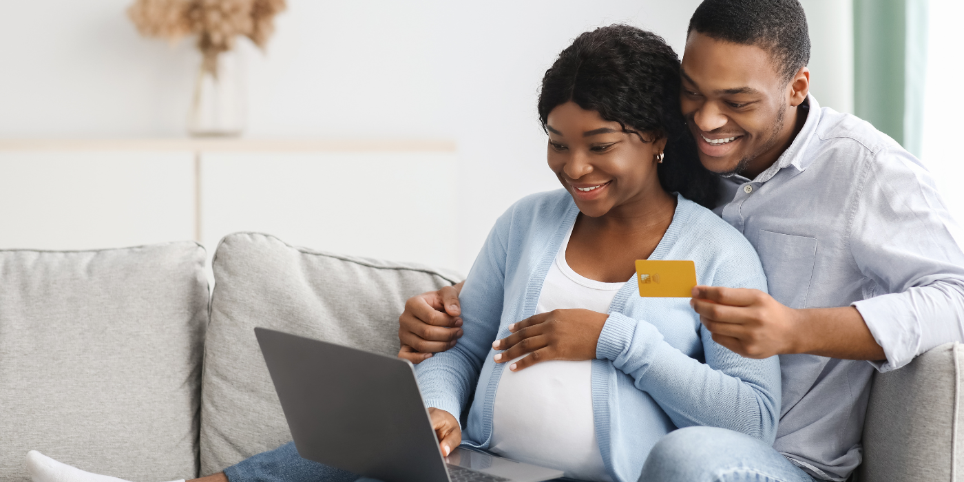 Pregnant couple online shopping
